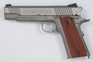 Swiss Arms SA 1911 .177 CO2 air pistol with chequered faux wooden grips, multi-shot magazine and