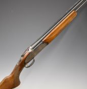 Rizzini 12 bore over and under ejector shotgun with engraved scenes of birds to the sidelock