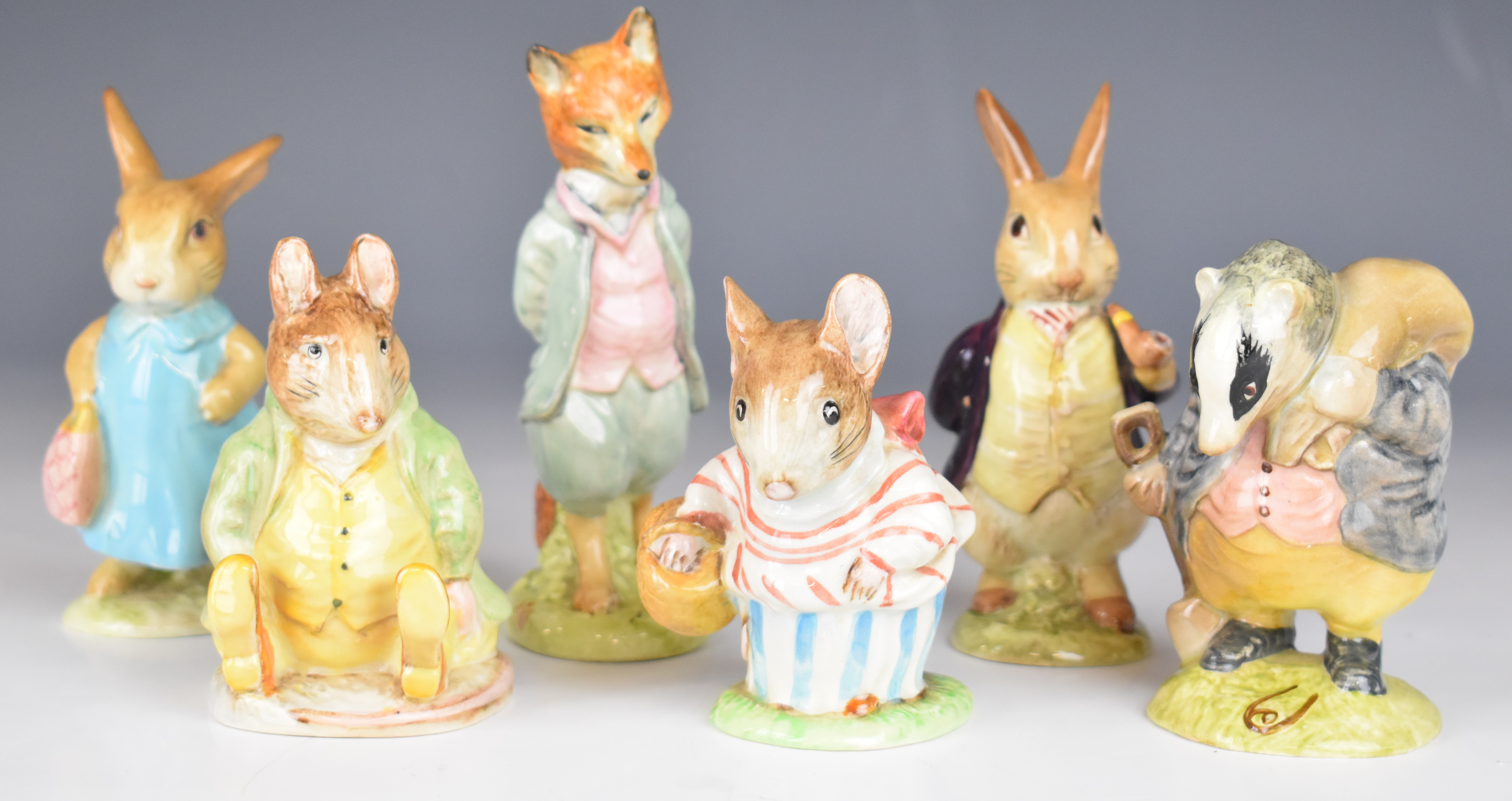 Six Beswick Beatrix Potter figures including five with gold oval BP2 backstamps, tallest 12cm