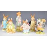 Six Beswick Beatrix Potter figures including five with gold oval BP2 backstamps, tallest 12cm