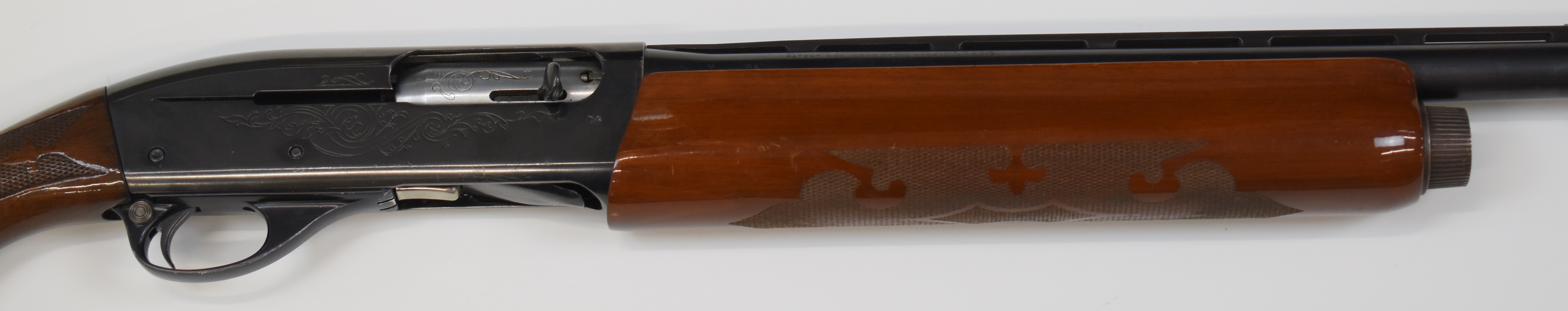 Remington Model 1100 12 bore 3-shot semi-automatic shotgun with ornately carved and chequered semi- - Image 4 of 10