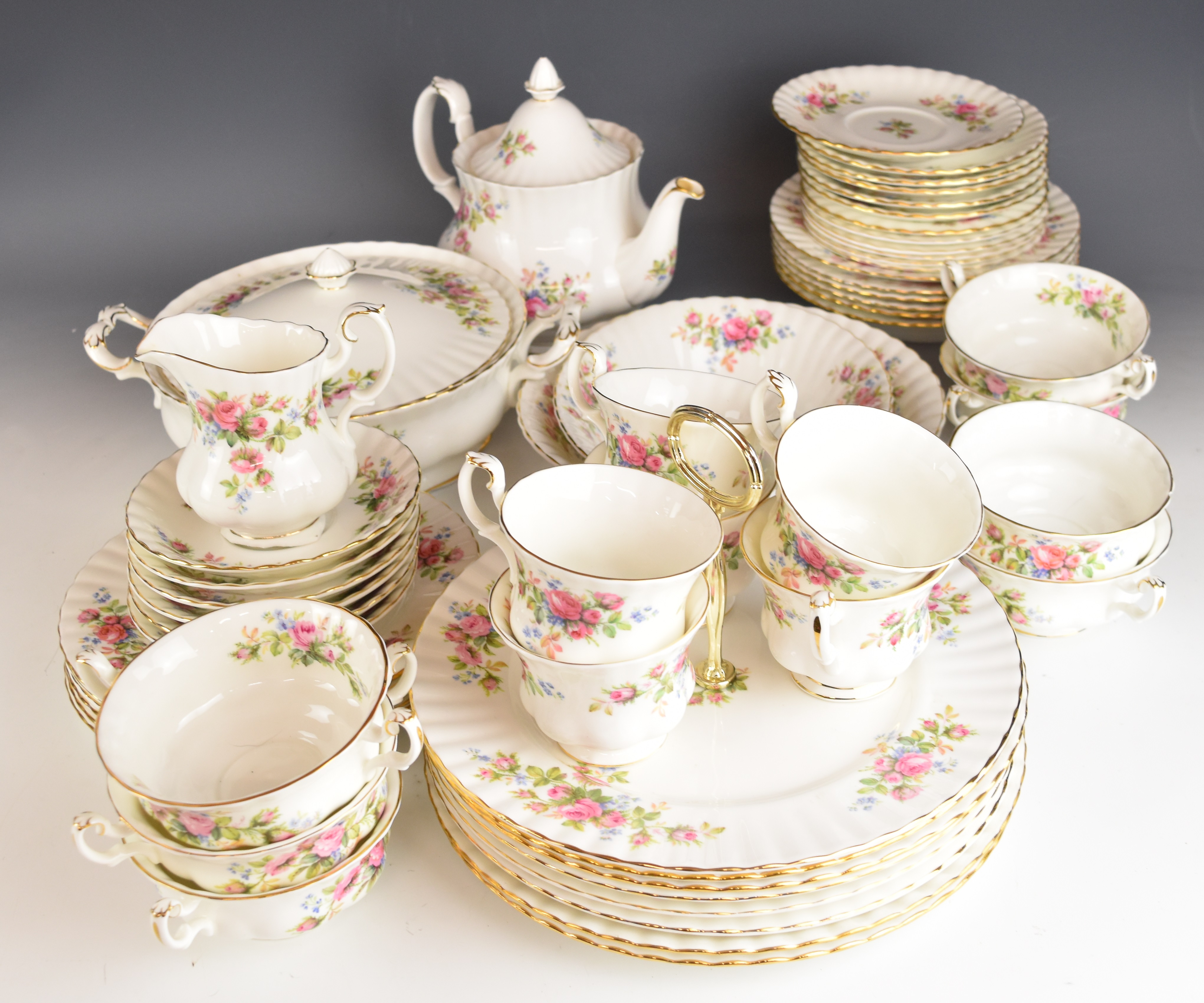 Royal Albert dinner and tea ware decorated in the Moss Rose pattern, approximately fifty three
