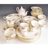 Royal Albert dinner and tea ware decorated in the Moss Rose pattern, approximately fifty three