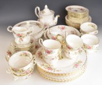 Royal Albert dinner and tea ware decorated in the Moss Rose pattern, approximately fifty three