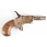 Derringer .30 rimfire pocket pistol with sheath trigger, wooden grips and 2.5 inch hand rotating