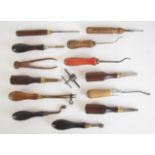 Fourteen vintage gun or gunsmith tools including screwdrivers, bullet moulds, chequering tools,