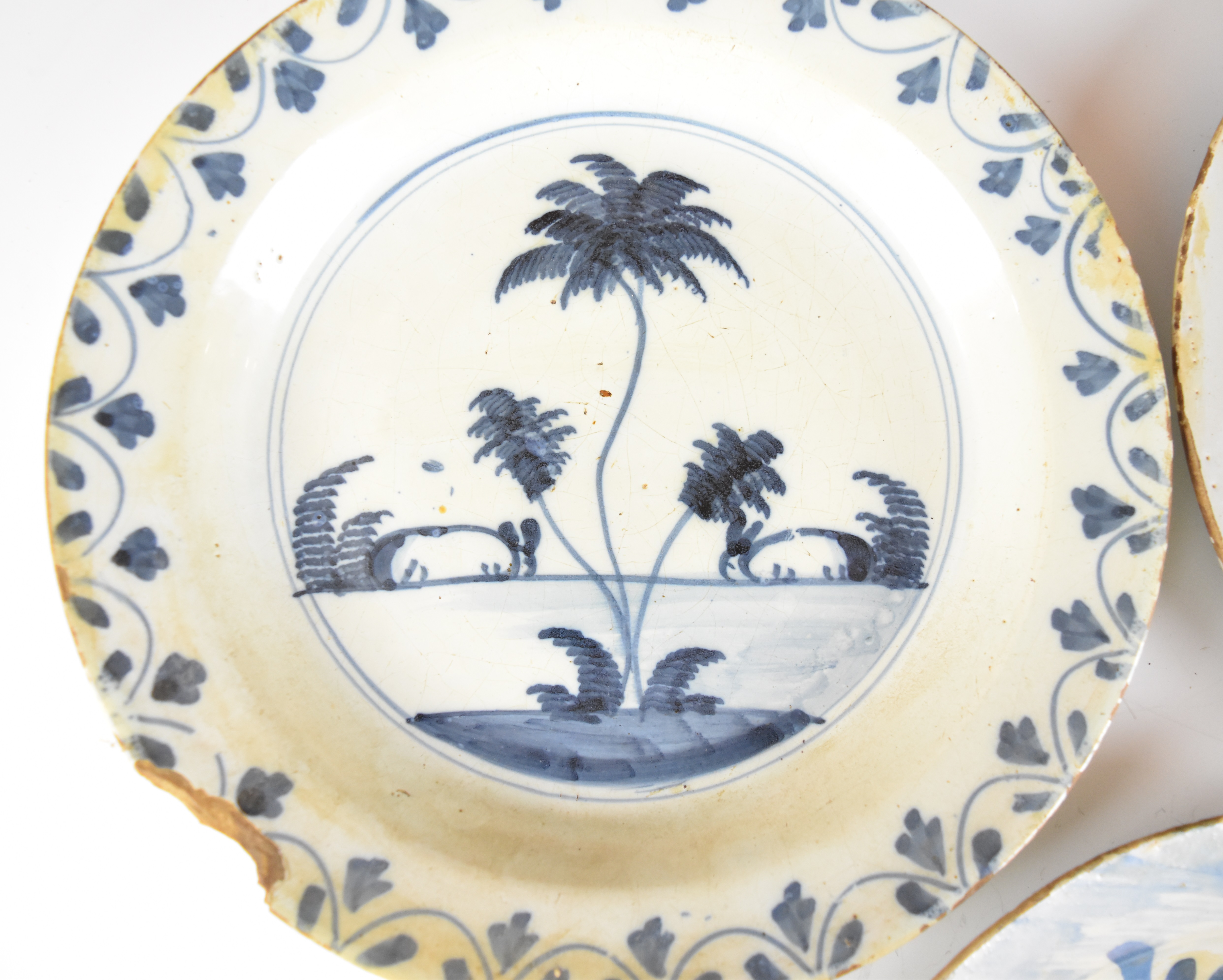 Three 18thC Delft plates including a polychrome example with exotic bird decoration, largest - Image 4 of 10