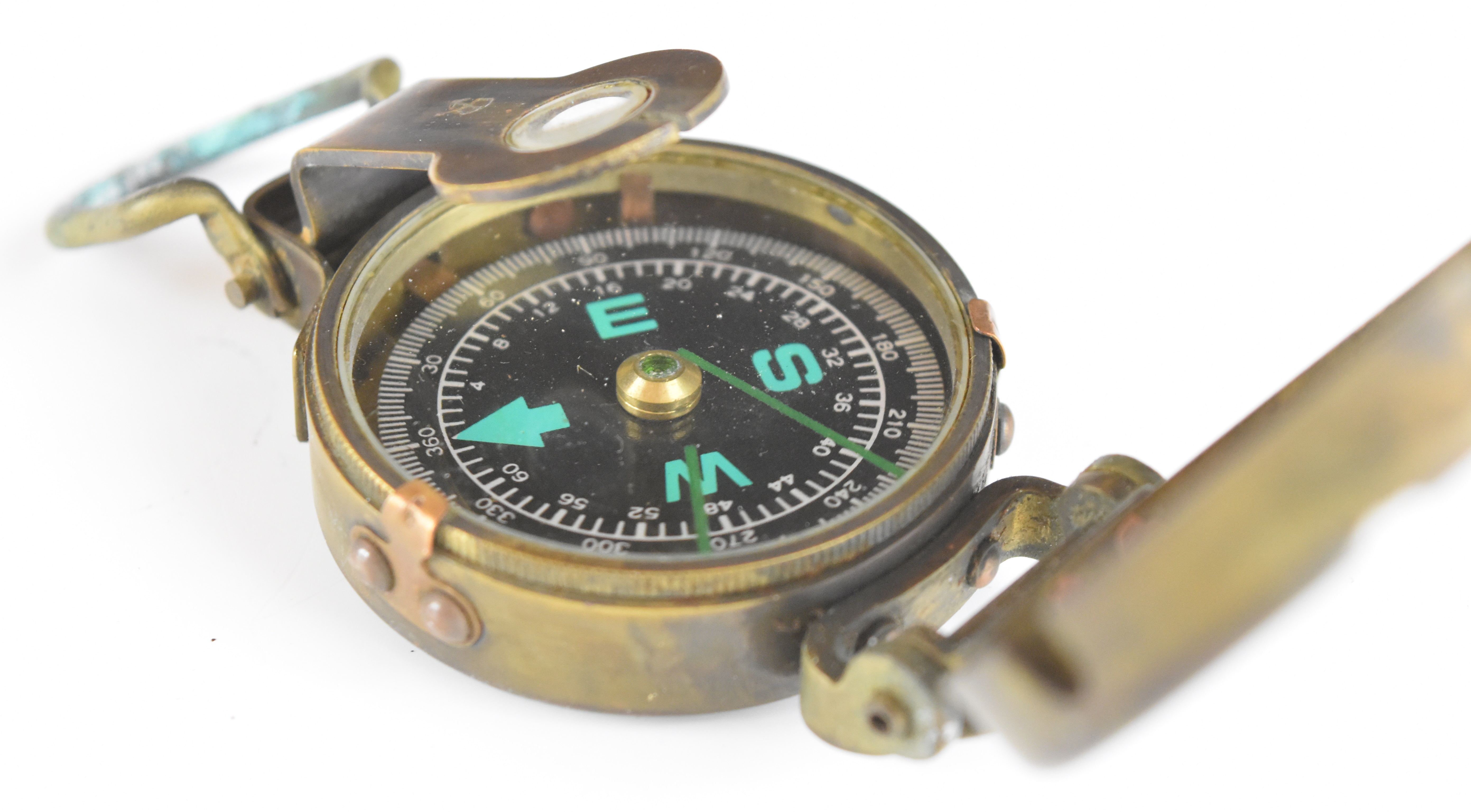 British WW2 prismatic compass by T G Co Ltd, London No B187104 1942 Mk III, with broad arrow mark, - Image 8 of 10