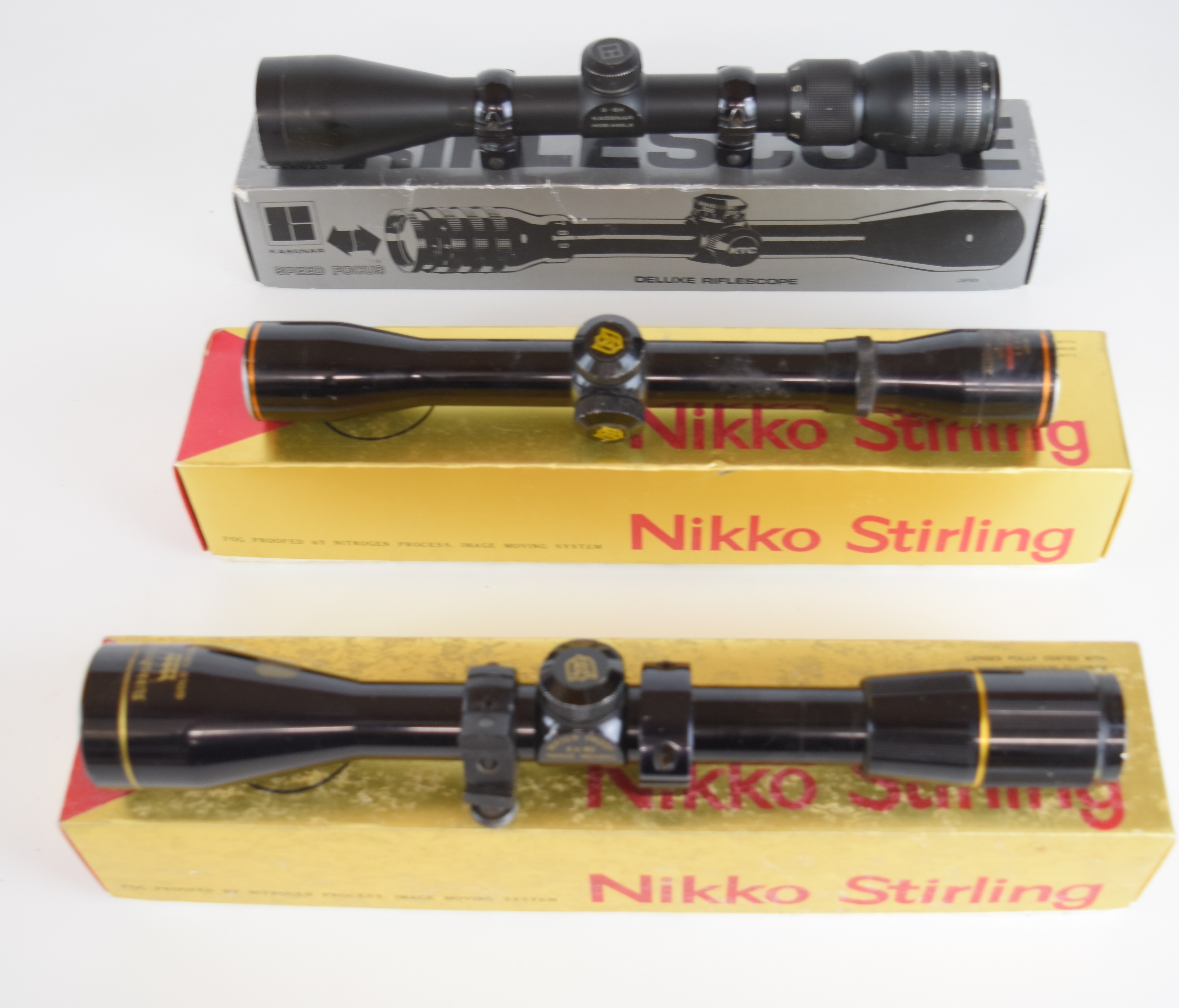 Three various rifle scopes, two Nikko Stirling Gold Crown 4x40 and Special 4x32 and the other