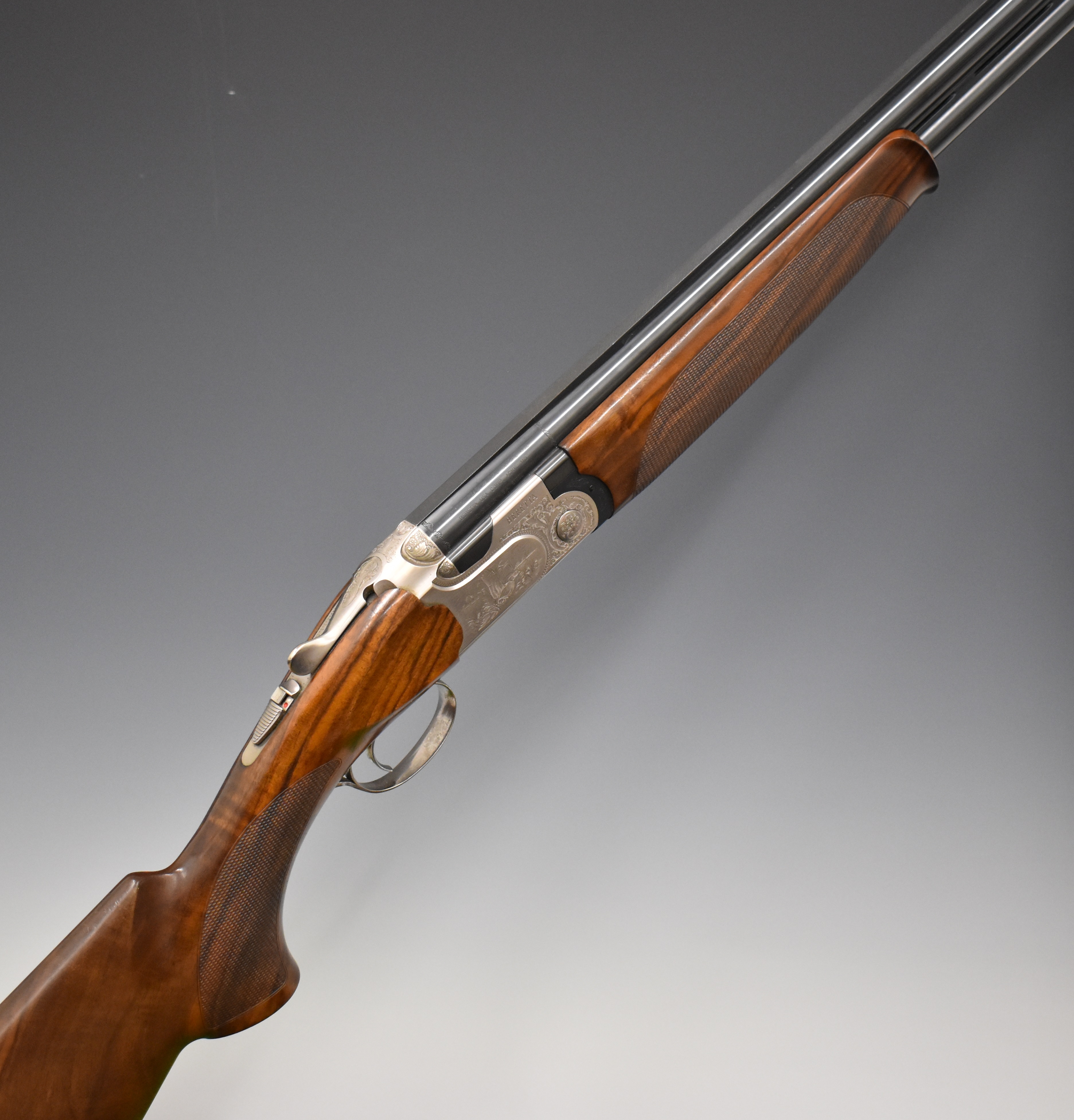 Beretta 690 III Sporting 12 bore over and under ejector shotgun with named and engraved scenes of