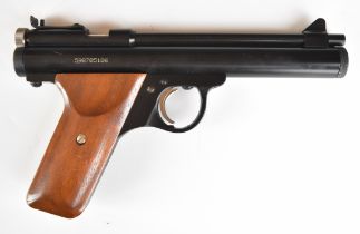 Benjamin Sheridan Model E9A .20 CO2 air pistol with wooden grip and adjustable sights, serial number