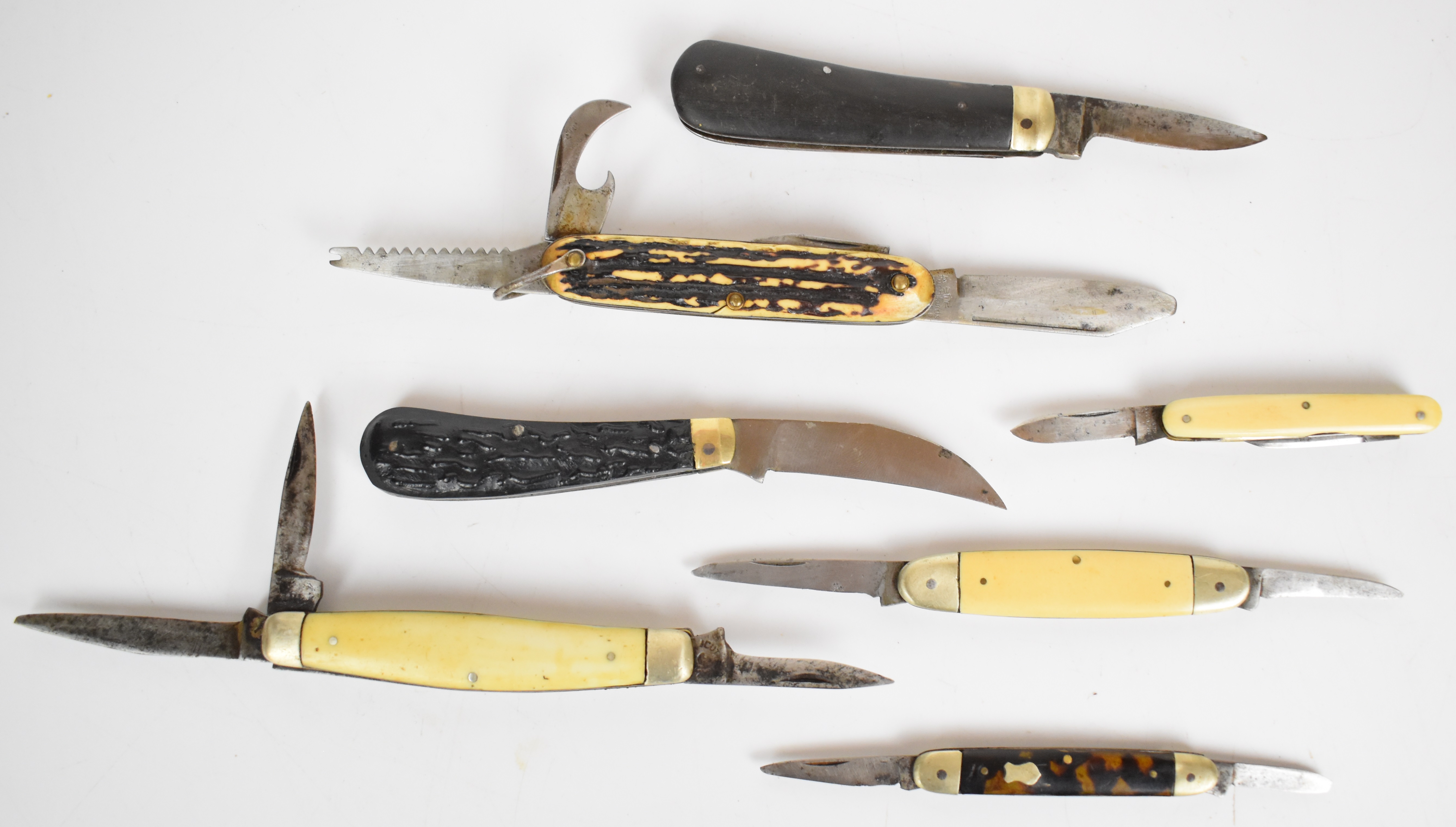 Seven pocket / folding knives including William Rogers, Richards, W Wilson & Sons and Rottgen,