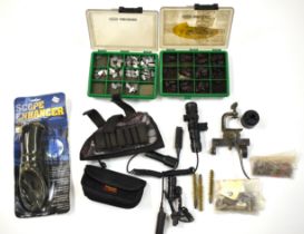 A collection of shooting accessories including gun foresights, Scope Enhancer, gun lights etc.