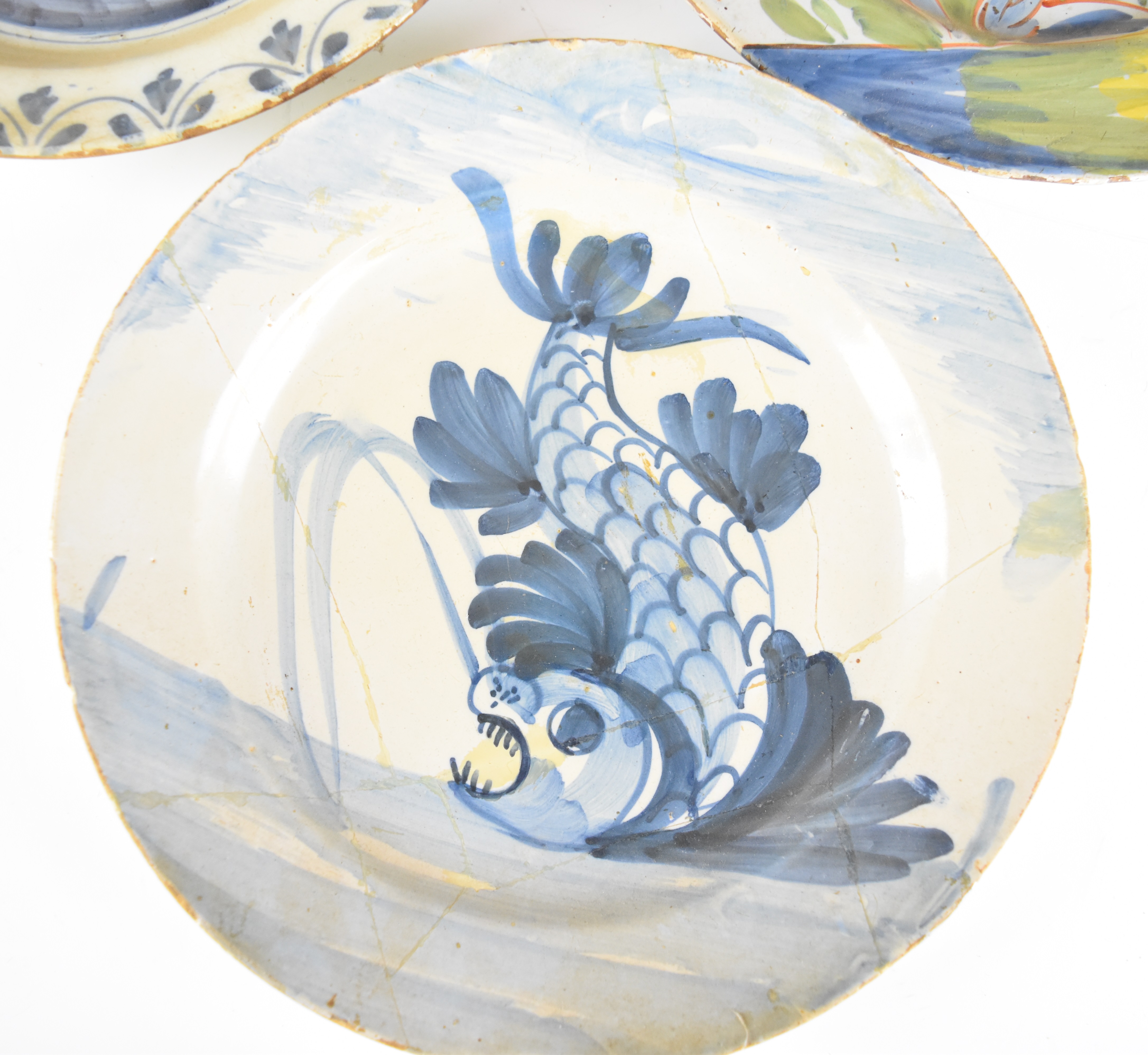 Three 18thC Delft plates including a polychrome example with exotic bird decoration, largest - Image 8 of 10
