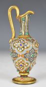 Moser glass pedestal ewer with gilt, enamelled and jewelled decoration, signed and numbered '2206