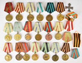 Collection of twenty Russian medals including Liberation of Belgrade, Defence of Leningrad,