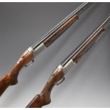 A pair of Miroku MK-60 Sport Universal SPG5 12 bore over and under ejector shotguns, each with