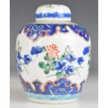 19thC Chinese covered ginger jar with botanical decoration and four character mark to base, height