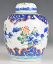 19thC Chinese covered ginger jar with botanical decoration and four character mark to base, height