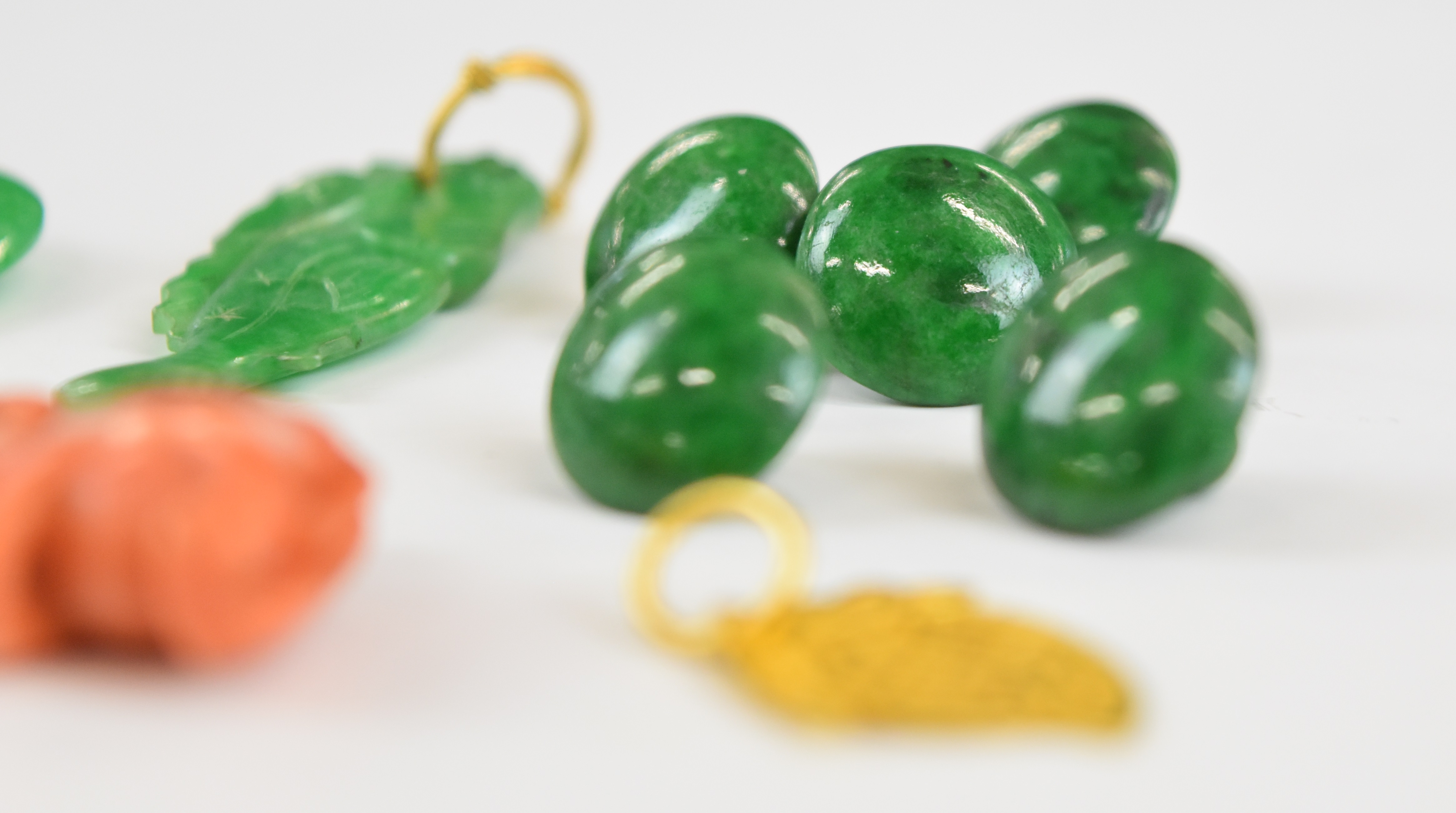 A yellow metal pendant (tests as 18k, 1g), two jadeite pendants one carved in the form of a fish and - Image 3 of 10