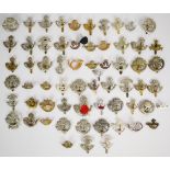 Collection of approximately 60 British Light Infantry badges including Durham, Somerset, Cornwall,