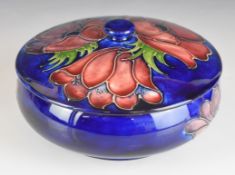 Moorcroft covered dish decorated in the Anemone pattern, diameter 18 x height 10cm