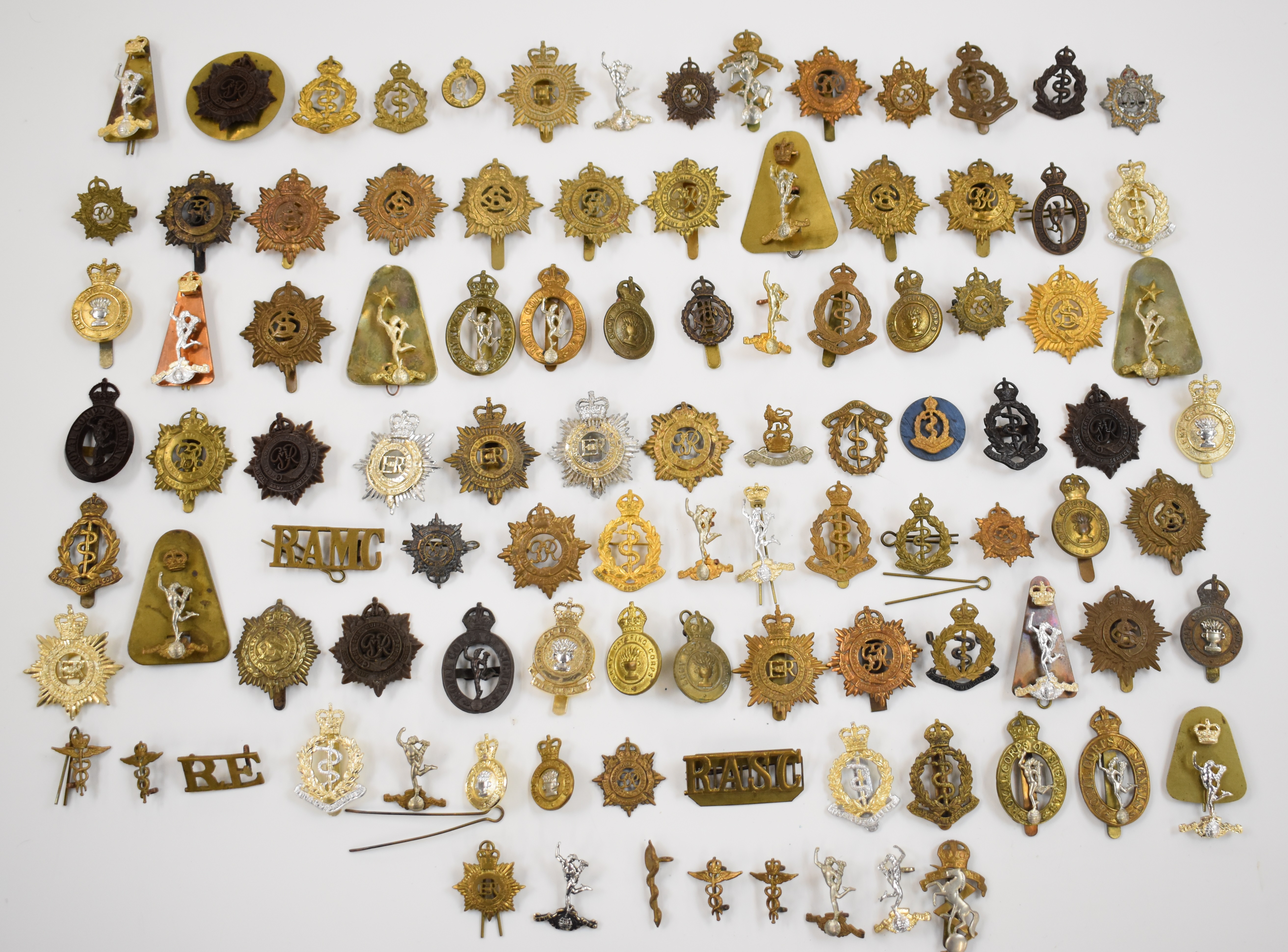 Collection of approximately 80 cap badges for the Army Service Corps, Royal Army Medical Corps and