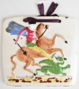 Early 19thC porcelain plaque with decoration in relief of a rider on rearing horse slaying a