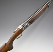 Beretta Ultra Light Deluxe 12 bore over and under ejector shotgun with gold birds engraved to the