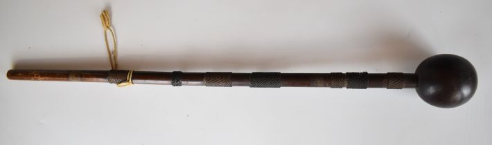 19thC African tribal knobkerrie with woven wire grips, 63cm long.