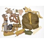 Military equipment including French respirator / gas mask in tin, Sam Browne belt, battle dress