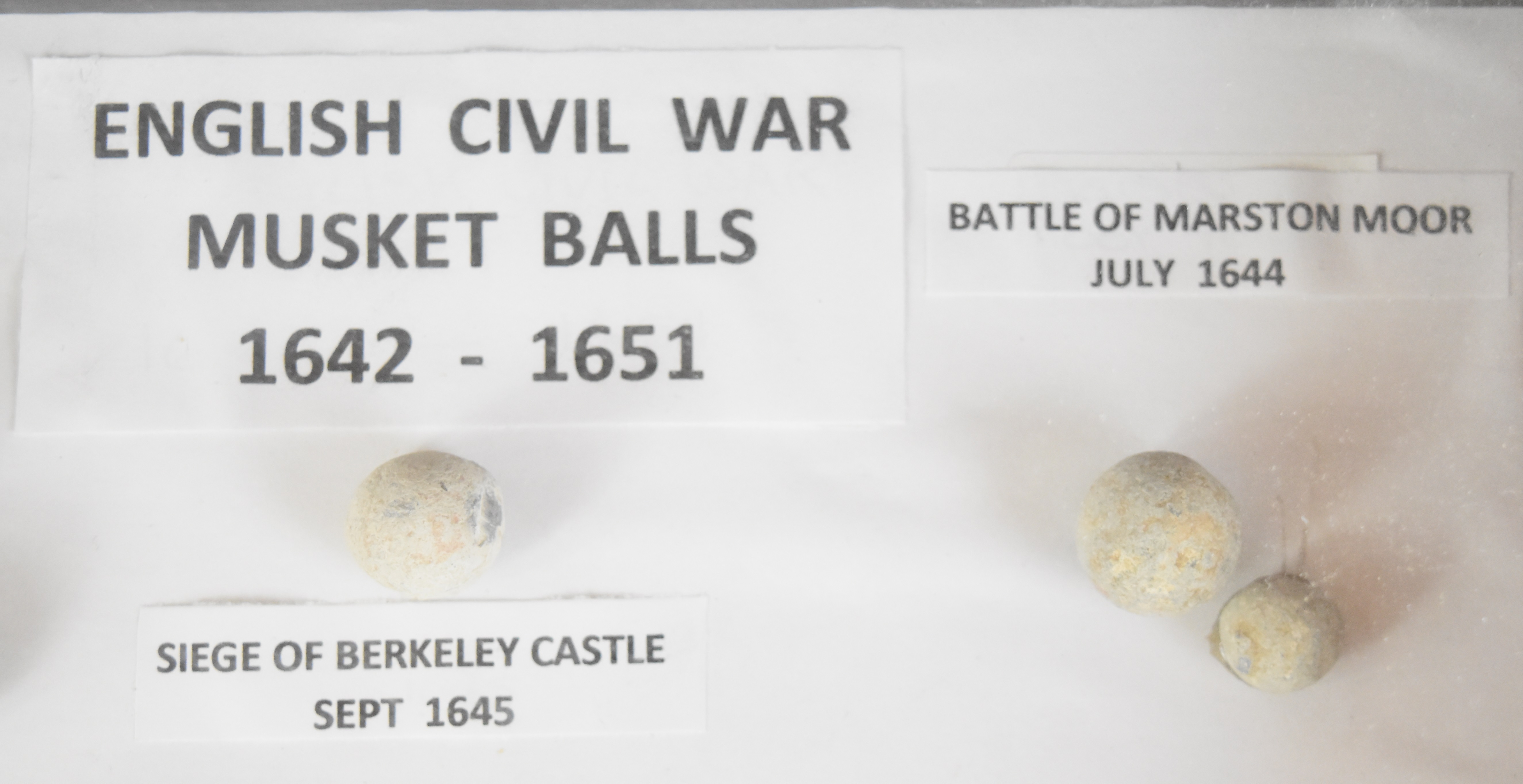 Mounted display of English Civil War musket balls comprising Siege of Basing House, Battle of - Image 4 of 4
