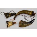 Four horn powder flasks with wooden fittings, one with carved decoration, largest 30cm long.