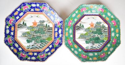 Pair of oriental enamelled hexagonal cabinet plates with landscape decoration, diameter 30cm