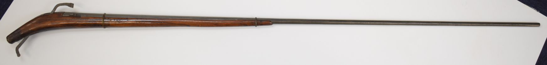 Japanese matchlock musket with engraved barrel bands, elm stock and 65 inch smooth bored barrel,