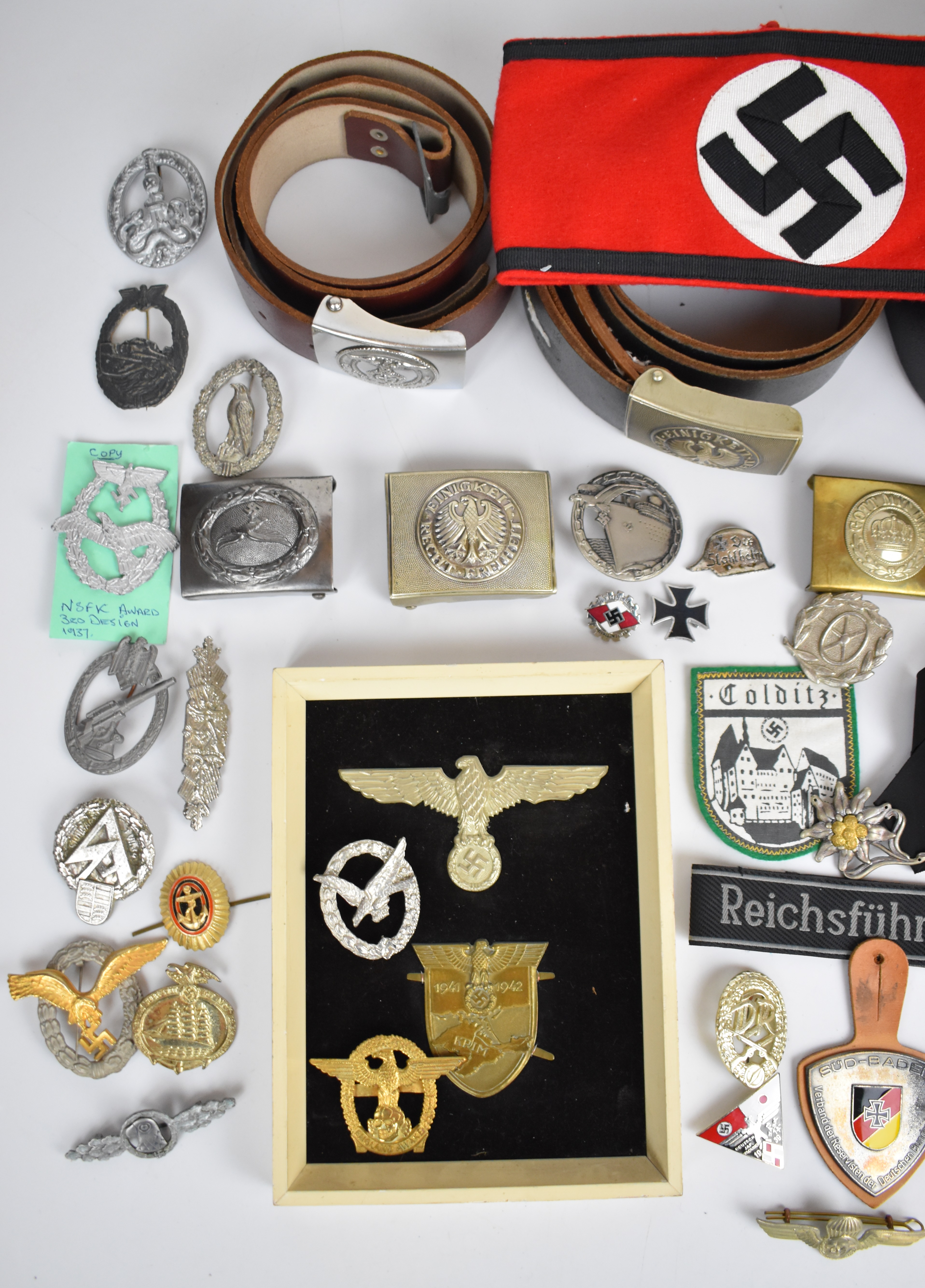 Collection of approximately 40 copy WW2 Nazi Third Rich badges, insignia, belts etc, including - Image 2 of 3
