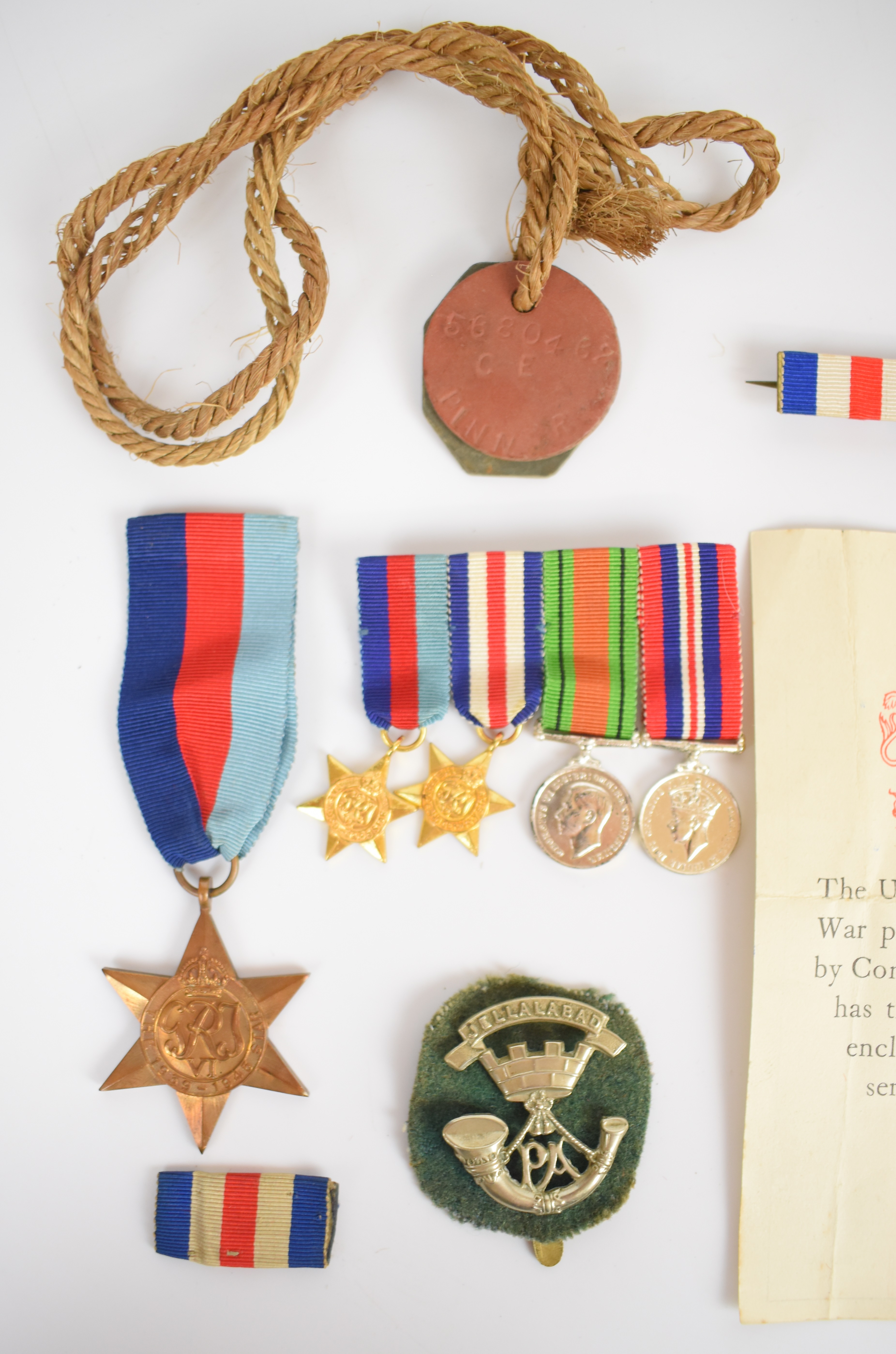 British Army WW2 group of four comprising 1939/1945 Star, France & Germany Star, Defence Medal and - Image 2 of 3