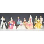 Eleven Royal Doulton figurines including several older examples Irene, Penelope, Pantalettes,