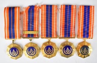 Five South African Defence Force Pro Patria Medals, one with clasp for Cunene