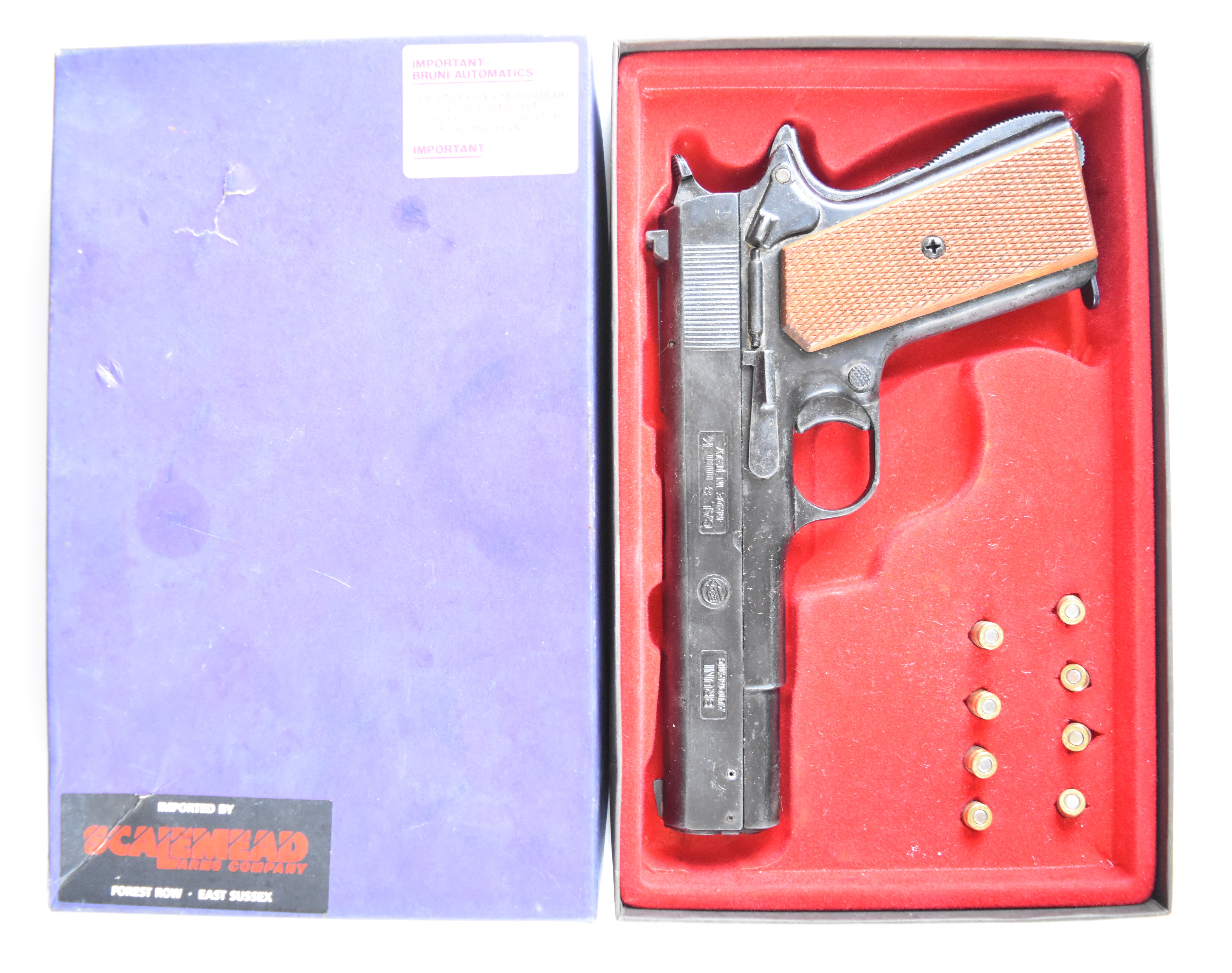 BBM Bruni 8mm blank firing pistol with chequered wooden grips, in original fitted box.