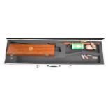 Shotgun or rifle hard carry or flight case with code locks, together with a T E Wood & Son