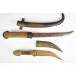 Two Jambiya daggers, the larger example with bone or similar grip and 22.5cm blade, the other of