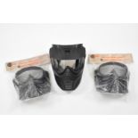 Three paintball masks including two SMK in original packaging.