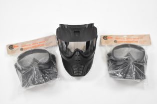 Three paintball masks including two SMK in original packaging.