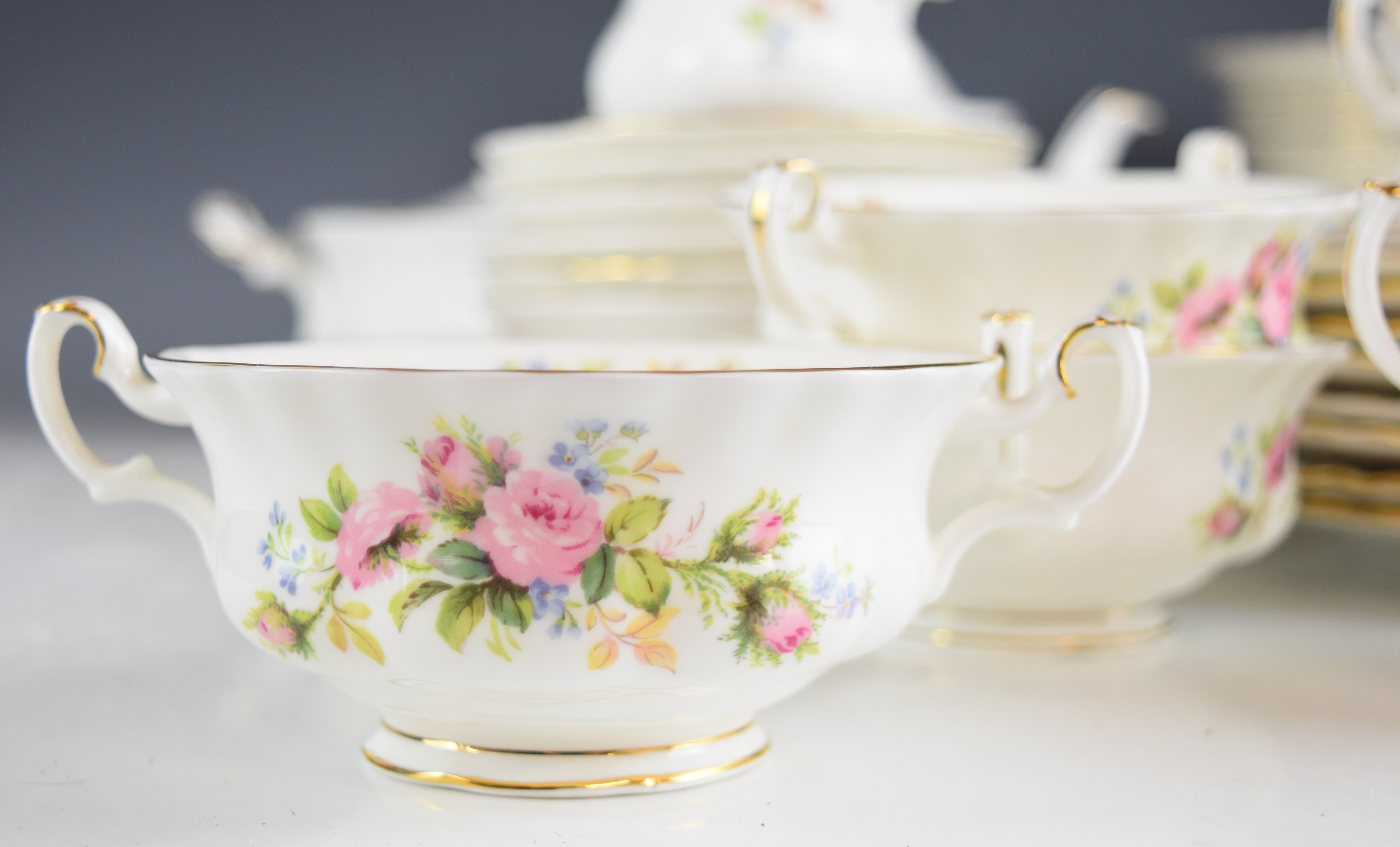 Royal Albert dinner and tea ware decorated in the Moss Rose pattern, approximately fifty three - Image 4 of 8