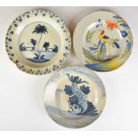 Three 18thC Delft plates including a polychrome example with exotic bird decoration, largest