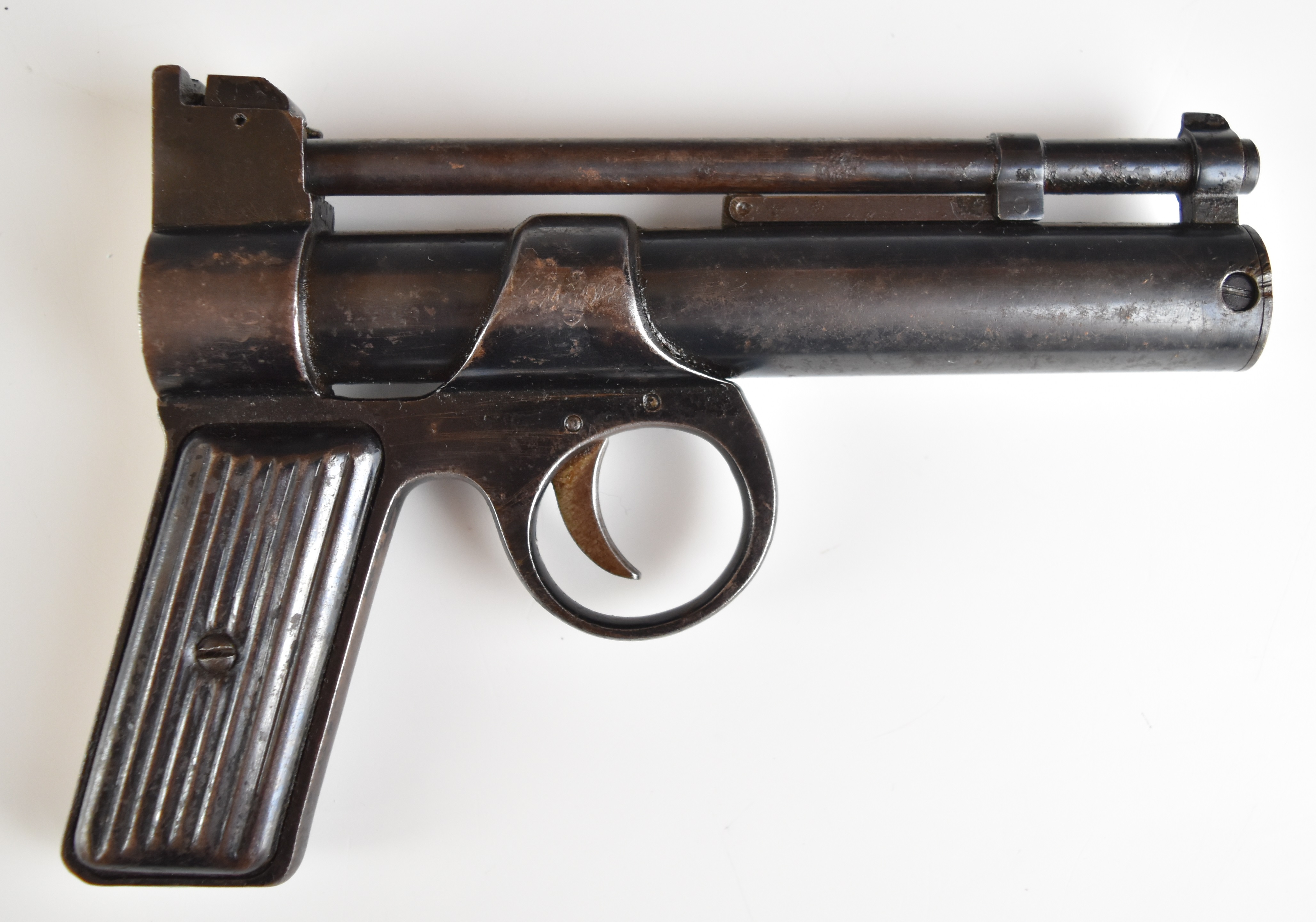 Webley Junior .177 air pistol with reeded metal grips and adjustable sights, serial number J34104.