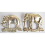 Two British Army 19th Hussars elephant design cap badges