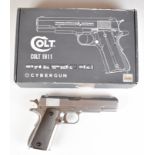 Cybergun Colt 1911 6mm CO2 airsoft pistol with chequered faux wooden grips, multi-shot magazine