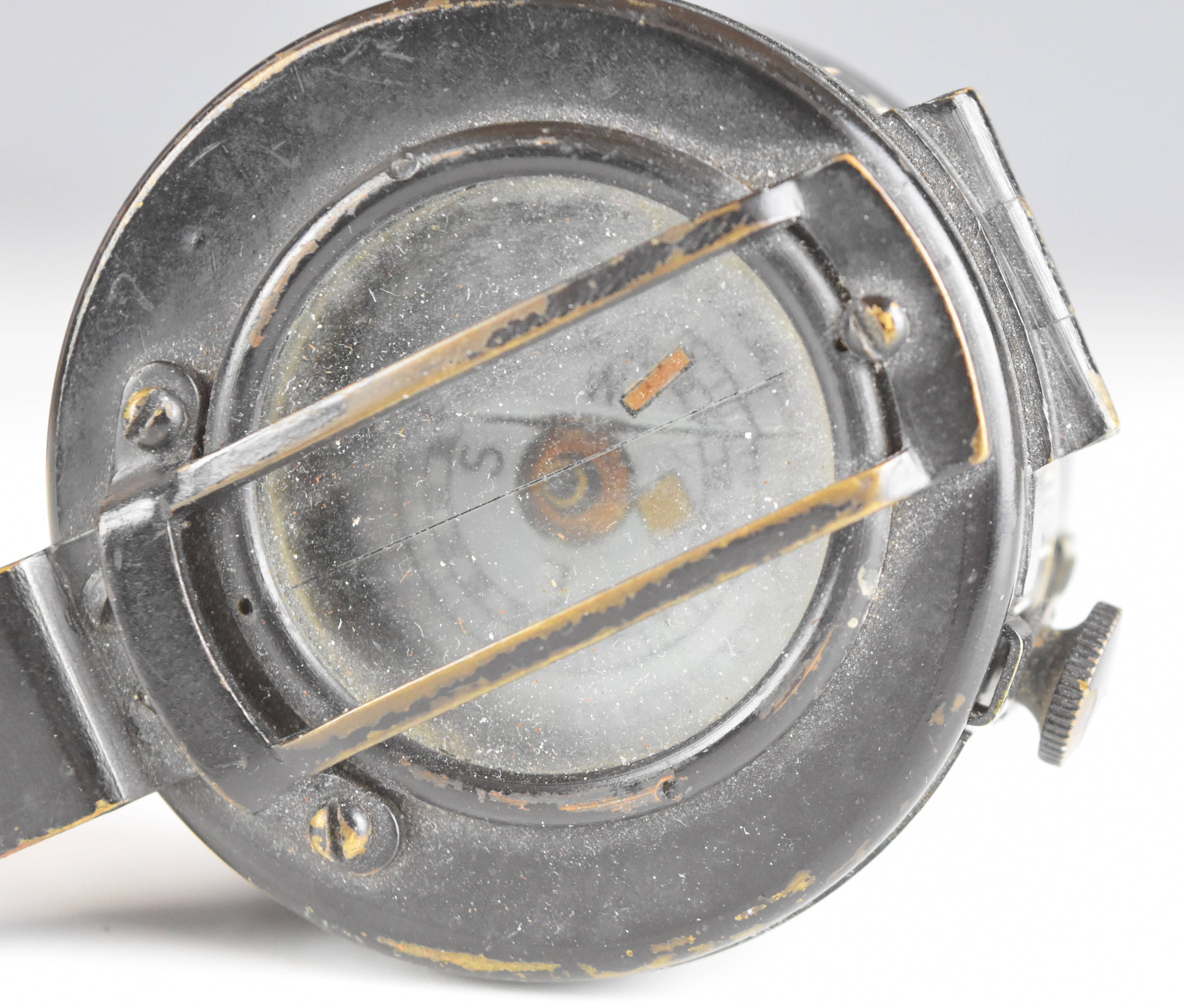 British WW2 prismatic compass by T G Co Ltd, London No B187104 1942 Mk III, with broad arrow mark, - Image 4 of 10